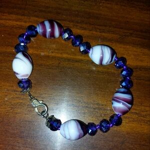 purple and white bracelet